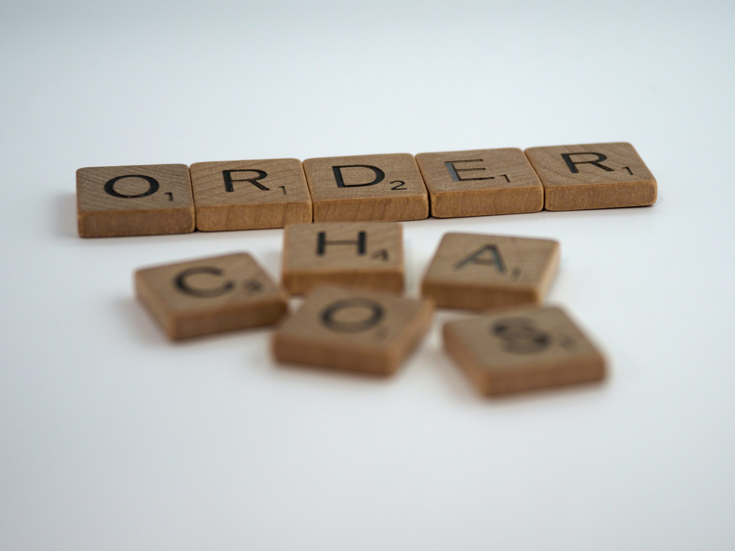 scrabble pieces spell order and chaos